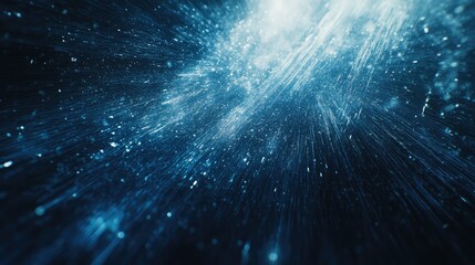 Obraz premium Blue particles burst outward in a vibrant blue energy explosion with radiating streaks and bokeh glow, evoking data transfer, futuristic tech, cosmic expansion and motion