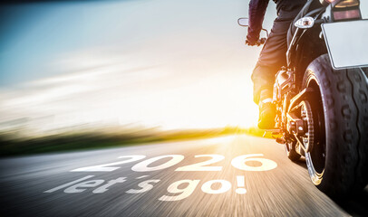 New year 2026 or start straight and beginning concept. Man ride on a motorbike and the number 2026...
