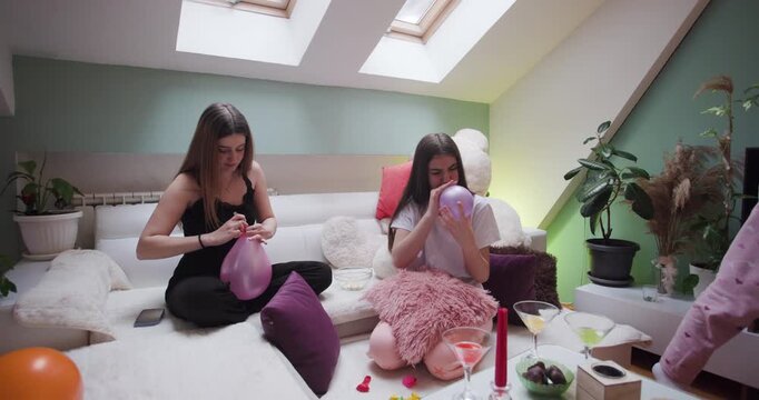 Fun girls' pijama party with friends in a cozy living room filled with laughter and enjoyable bonding time