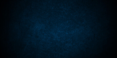 Dark Blue background with grunge backdrop texture, watercolor painted mottled blue background, colorful bright ink and watercolor textures on black paper background.