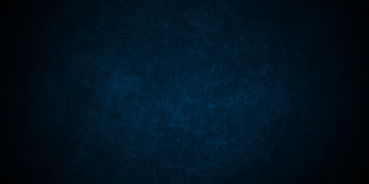 Dark Blue background with grunge backdrop texture, watercolor painted mottled blue background, colorful bright ink and watercolor textures on black paper background.