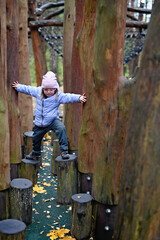 Kid in autumn park