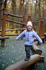 Kid in autumn park