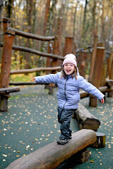 Kid in autumn park