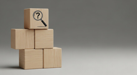 Obraz premium Wooden blocks with magnifying glass and question mark in soft studio lighting on gray gradient background for business