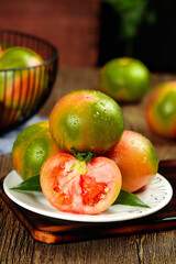 Fresh Ripe Tomatoes with Water Droplets on Rustic Wooden Table - Healthy Organic Vegetables