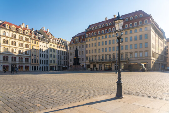 View of Altmarkt square buildings gleam under a clear sky with a baroque tower rising amidst the architectural harmony, Dresden, Saxony, Germany.