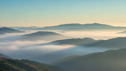 Obraz premium Majestic mountain peaks emerge above a breathtaking sea of clouds, illuminated by the gentle golden light of dawn, creating a serene and expansive natural landscape vista