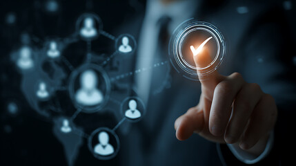 Hand touches glowing checkmark on digital network finger touching