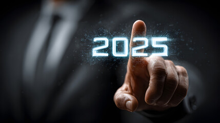 Businessman touching virtual screen with business plan or marketing strategy for the new year 2025 concept