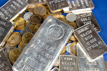 Closeup view Gold Silver bars and coins on table, trading metals concept