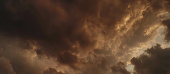 Obraz premium Dramatic Sky with Fiery Clouds and Dark Shadows.