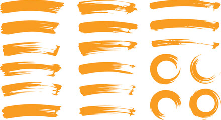 Obraz premium Set of diverse orange paint brush strokes and circular shapes creating a dynamic visual collection