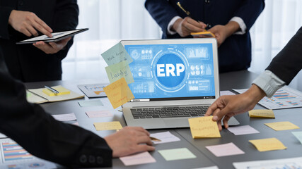 Analyst team use sticky note for creative and analytic brainstorm for business idea with BI data dashboard on laptop screen. Analysis financial data visualization tech for marketing strategy. Prodigy