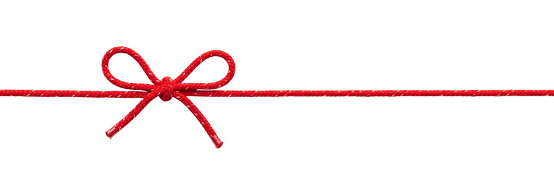 Vibrant red string tied in a decorative bow, extending horizontally on a clean white background, ideal for gift wrapping, holiday designs, and festive celebrations