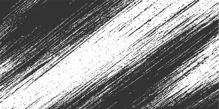 Abstract dark grey brush strokes and speckles on white background diagonal textured pattern grunge paint