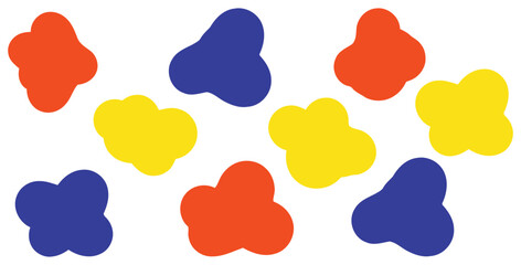 Abstract pattern of scattered primary color blobs in bright orange blue and yellow against white