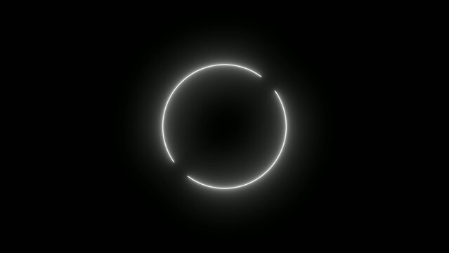 Generate title without using the word "Title:" before it. White glowing circular ring on a dark background with a bright continuous light effect