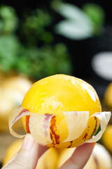 Fresh Yellow Melon with Peeled Skin Close-up © LanThi