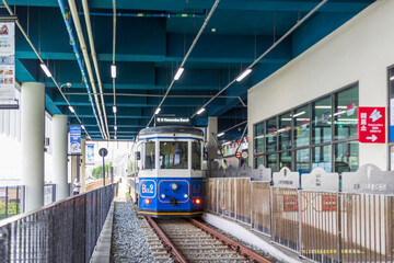 Busan, South Korea - 02 Sep, 2025 - Tourists boarding the Haeundae Beach Train at the seaside station, a popular attraction for coastal sightseeing in Busan.