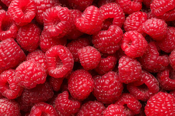 Fresh ripe raspberries as background, top view