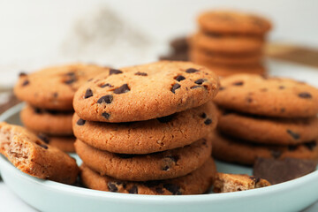 Delicious chocolate chip cookies on table, closeup