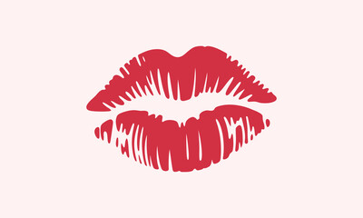 Red lipstick kiss mark on light pink background 