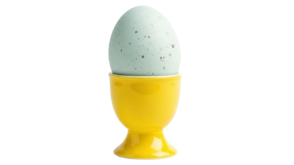 Speckled blue egg in yellow egg cup isolated PNG, Easter breakfast food on transparent background