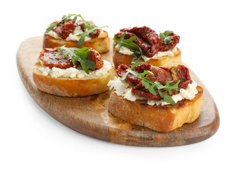 Delicious bruschettas with cream cheese, sun-dried tomatoes and arugula isolated on white