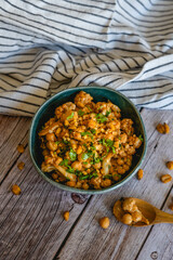 homemade recipe for chickpeas with cauliflower curry spices home table