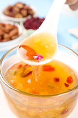Gourmet Honey Soup with Dried Fruits, Nuts and Edible Flowers