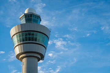 Modern Airport Control Tower Against a Clear Blue Sky
