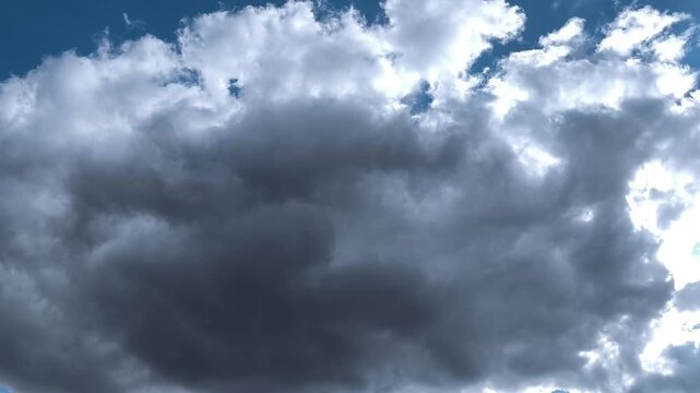 Very bright sky illuminates the two different types of clouds
