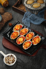 Steamed Korean Abalone with Garlic and Spicy Vegetable Topping
