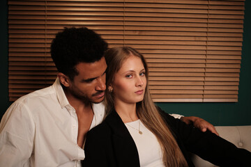 Interracial couple sharing an intimate loving moment