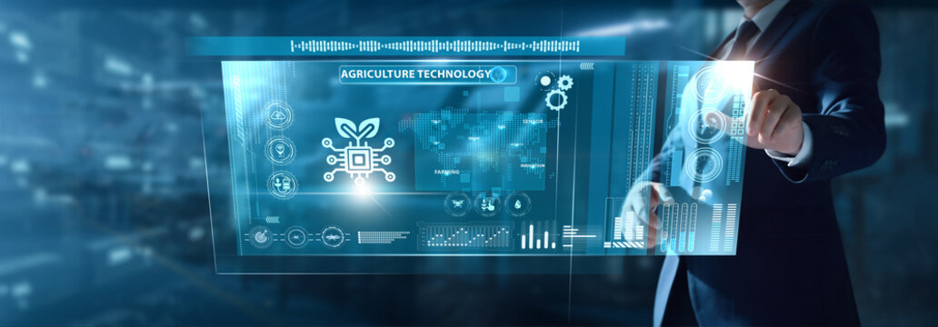 Businessman analyzing Agriculture Technology data on virtual interface crop analytics, smart farming, soil monitoring, drone mapping, precision irrigation, yield forecasting. - Powered by Adobe