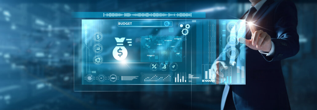 Businessman analyzing Budget data on virtual interface expense charts, financial planning, cost reduction, revenue tracking, cash flow insights, fiscal strategy. - Powered by Adobe