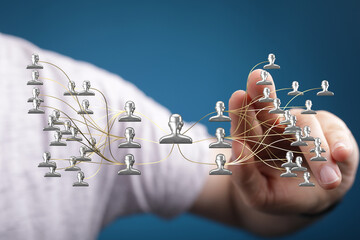 Abstract image visualizing a digital network with a touch interaction. Shows concept of teamwork,...