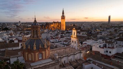 Fototapeta premium Night time aerial view of the historic old town city center of Seville, Andalusia, Spain.