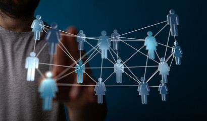 Abstract visualization of a connected network representing communication, business, or community with a person interacting with digital interfac