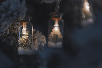 Christmas Tree with Bottle Lights and Miniature Pine Decorations. Soft focus