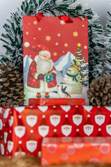 a close up image of a festive gifts with father Christmas santa clause decoration