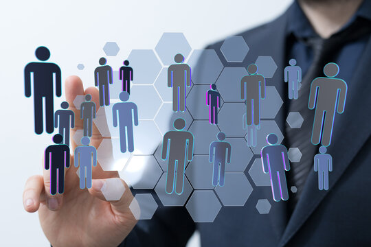Hand interacting with virtual human figures representing social connections, networking, and teamwork in a mode