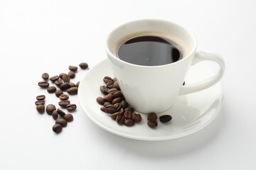 Cup of aromatic coffee and roasted beans on white background, closeup