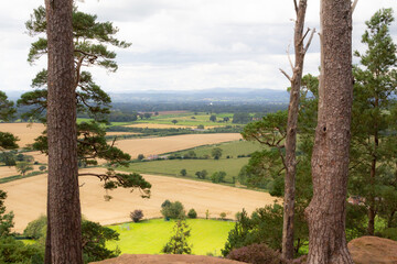 Our green and pleasant land, view over the Shropshire countryside towards the Welsh mountains from a hill top near Shrewsbury .