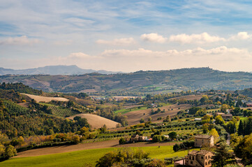 The Marche, a region of eastern Italy, rises between the Apennine mountains and the Adriatic Sea.