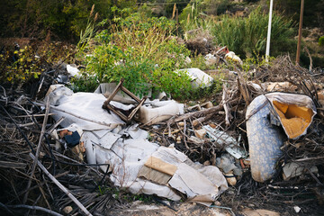 Debris outside houses due to a flash flood in Spain
