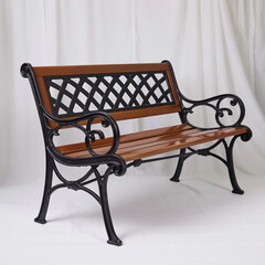 Classic wooden park bench with ornate cast iron frame