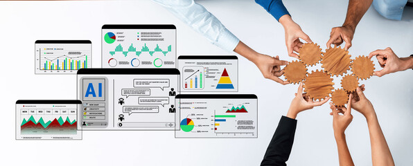 A diverse team collaborates around a table, analyzing business data presented on laptops, with gears symbolizing teamwork and innovation in the workplace. Trope