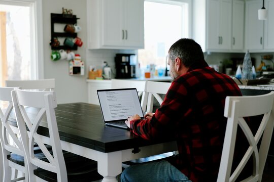 Middle Aged Man Applies for Student Loan Financial Aid and Scholarships - Never Too Late to Return to School - Adult Higher Education Growth Concept